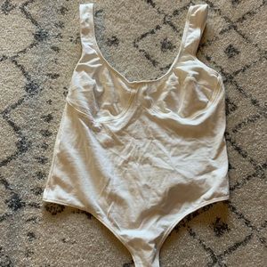 thong white body suit
